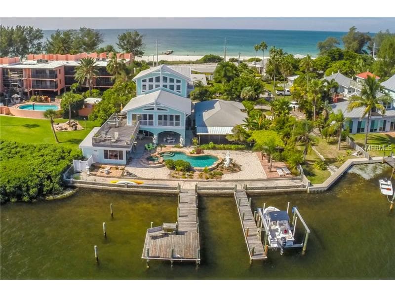 Sarasota, Florida | Innholdsrik strandeiendom ved mexicogulfen med privat båtbrygge og basseng